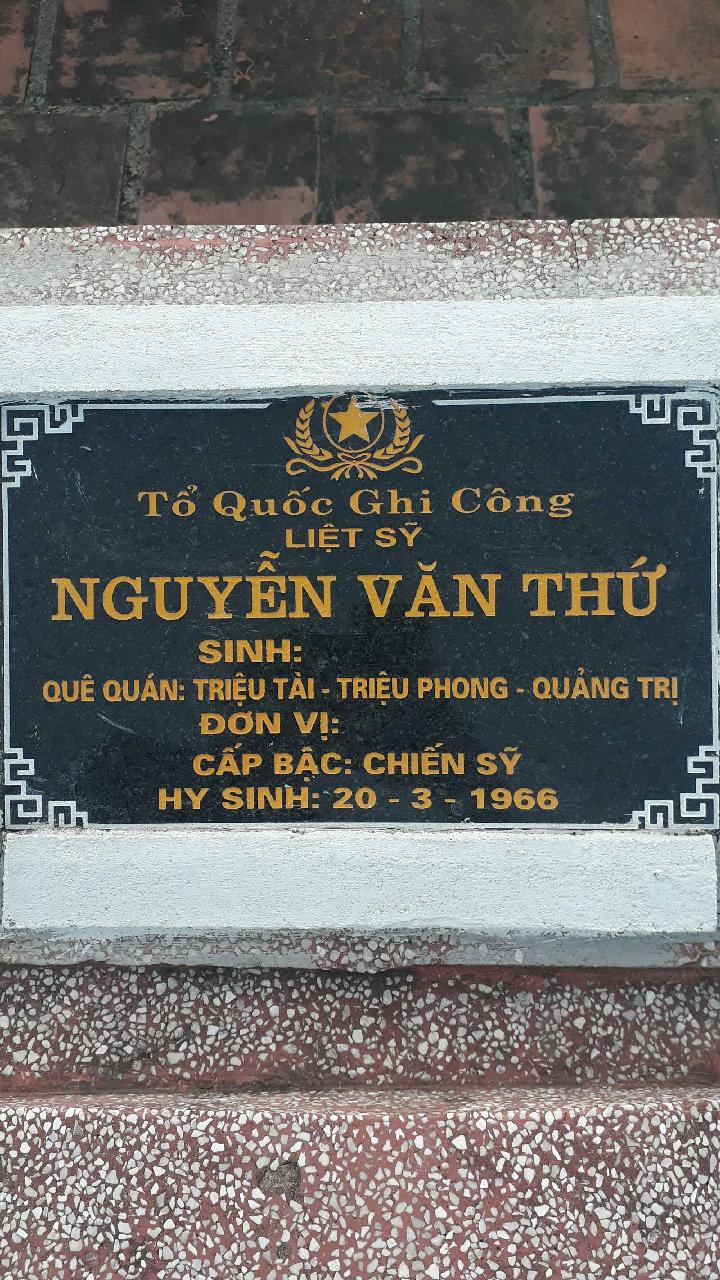 Ảnh mộ liệt sĩ Nguyễn Văn Thứ