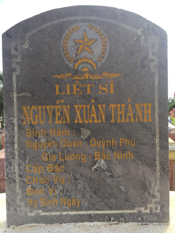 Ảnh mộ liệt sĩ Nguyễn Xuân Thành